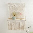 Macrame wall hanging with single shelf